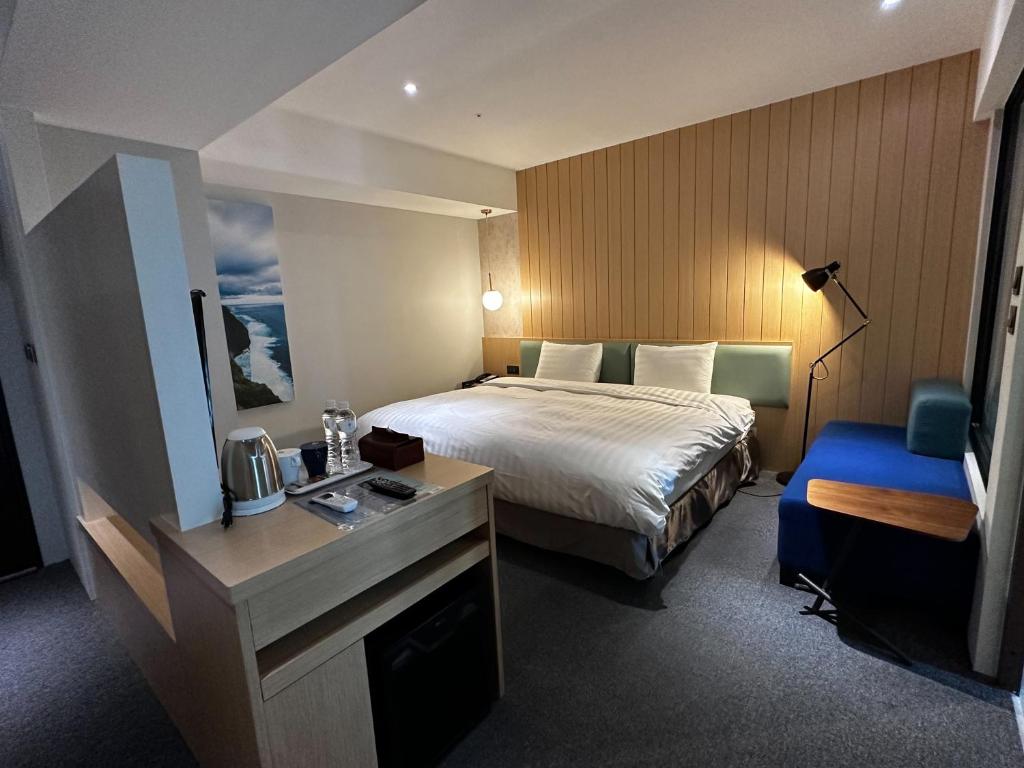 Postel nebo postele na pokoji v ubytování E Hotel