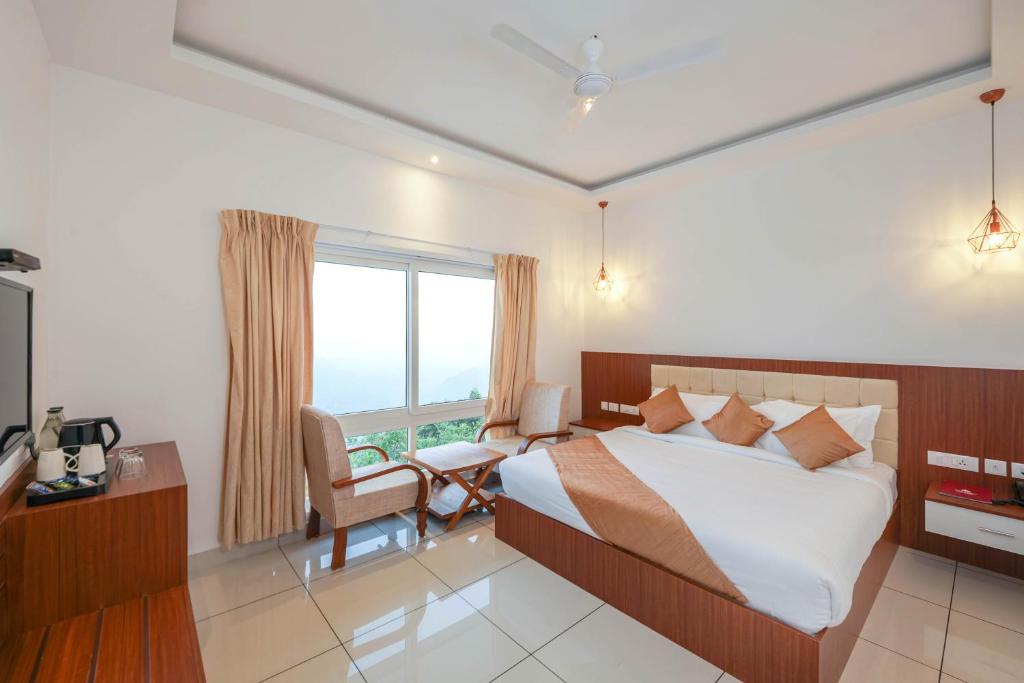Postel nebo postele na pokoji v ubytování Sprise Munnar Resort and Spa