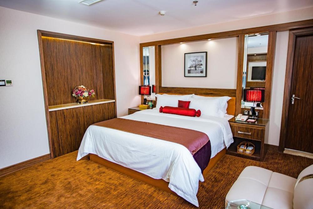 Postel nebo postele na pokoji v ubytování Nanyang King's Gate Hotel--Free Shuttle Service to Canton Fair