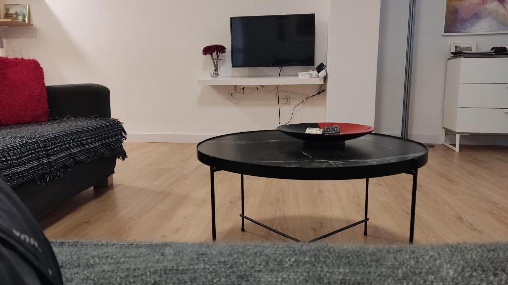 Televízia a/alebo spoločenská miestnosť v ubytovaní Céntrico Apartamento en Ronda