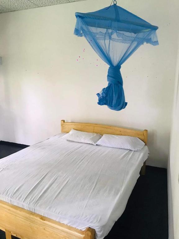 Postel nebo postele na pokoji v ubytování Nature Inn