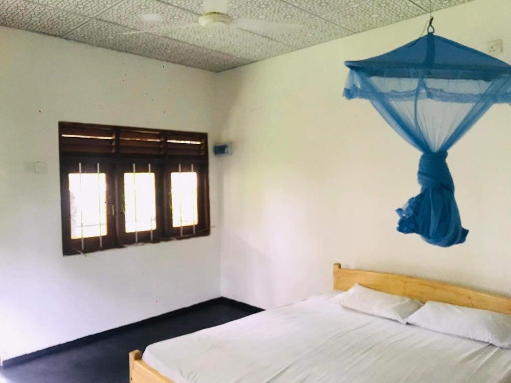 Postel nebo postele na pokoji v ubytování Nature Inn