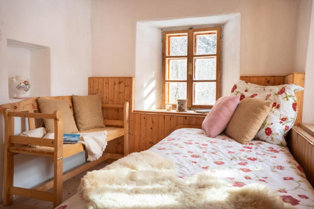 Postel nebo postele na pokoji v ubytování Bezgova Hišica