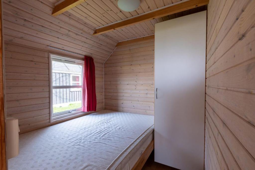 Postel nebo postele na pokoji v ubytování Velling Koller Hotel og Camping