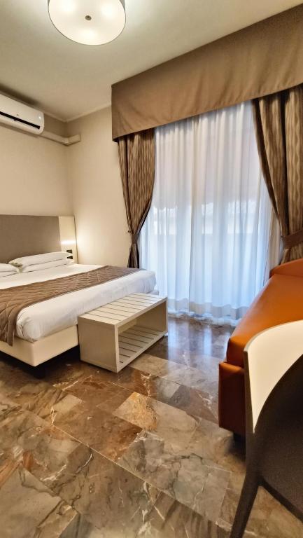 A bed or beds in a room at Valmarina