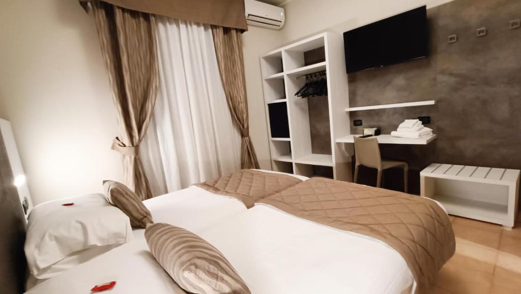 A bed or beds in a room at Valmarina