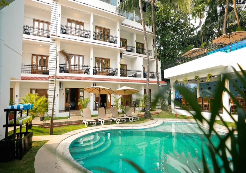 Bazén v ubytování The Verda De Miranda Resort Morjim North Goa nebo v jeho okolí