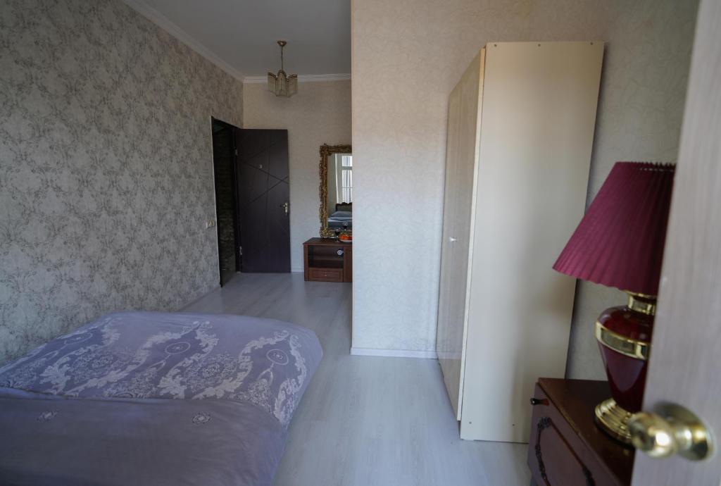 Llit o llits en una habitació de Leon Rooms