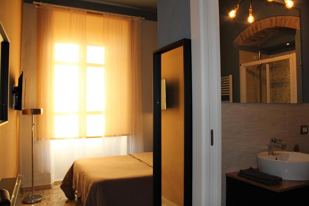 Postel nebo postele na pokoji v ubytování al 28 B&B