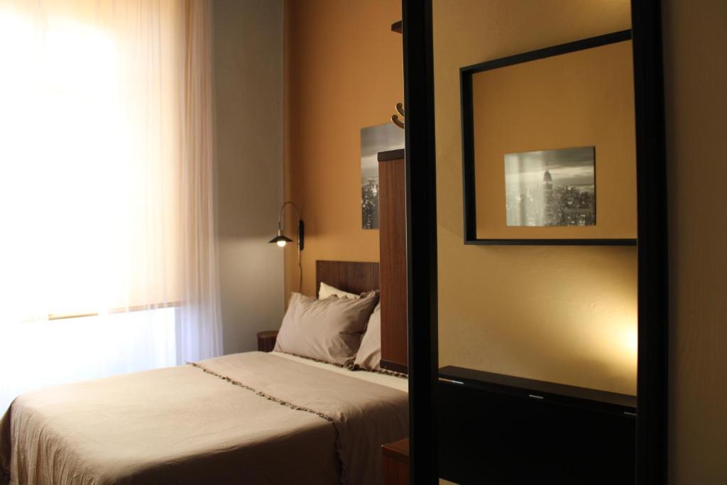 Postel nebo postele na pokoji v ubytování al 28 B&B