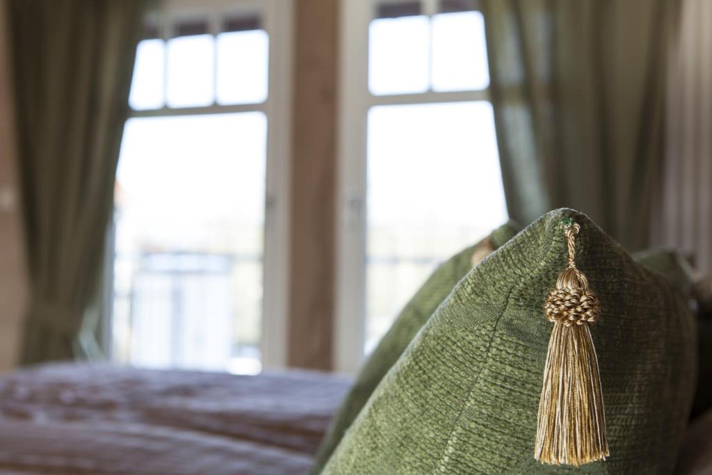 Postel nebo postele na pokoji v ubytování Hotel Bellini