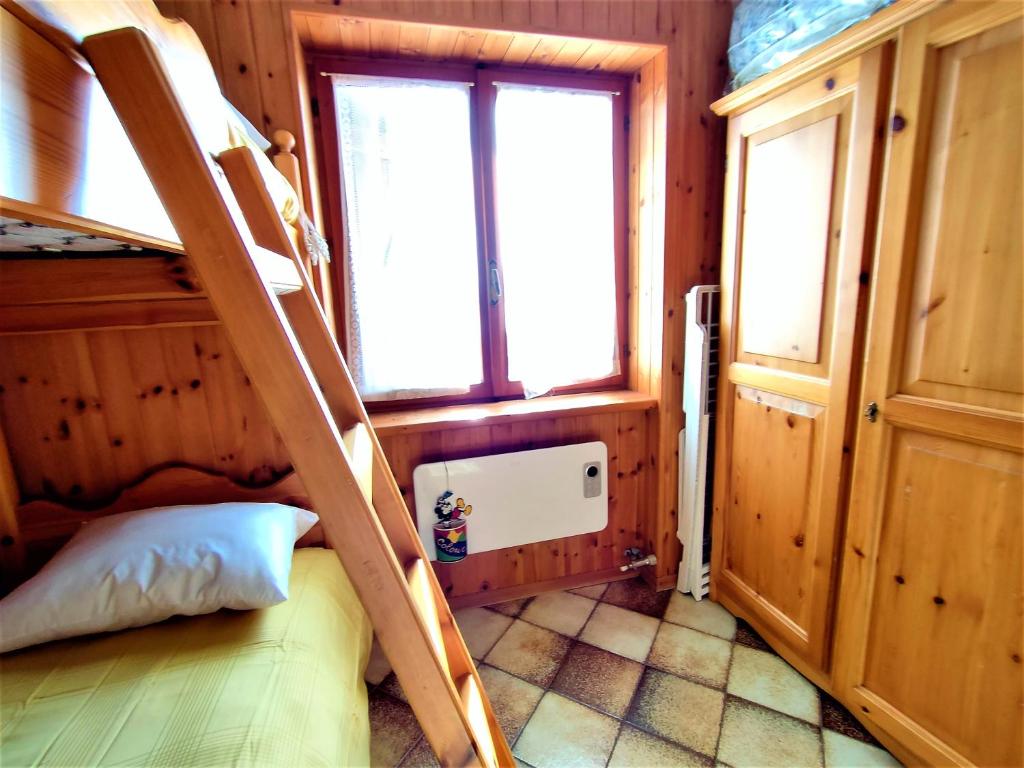 Postel nebo postele na pokoji v ubytování Maison Elios 1 CIR-TORGNON-0024