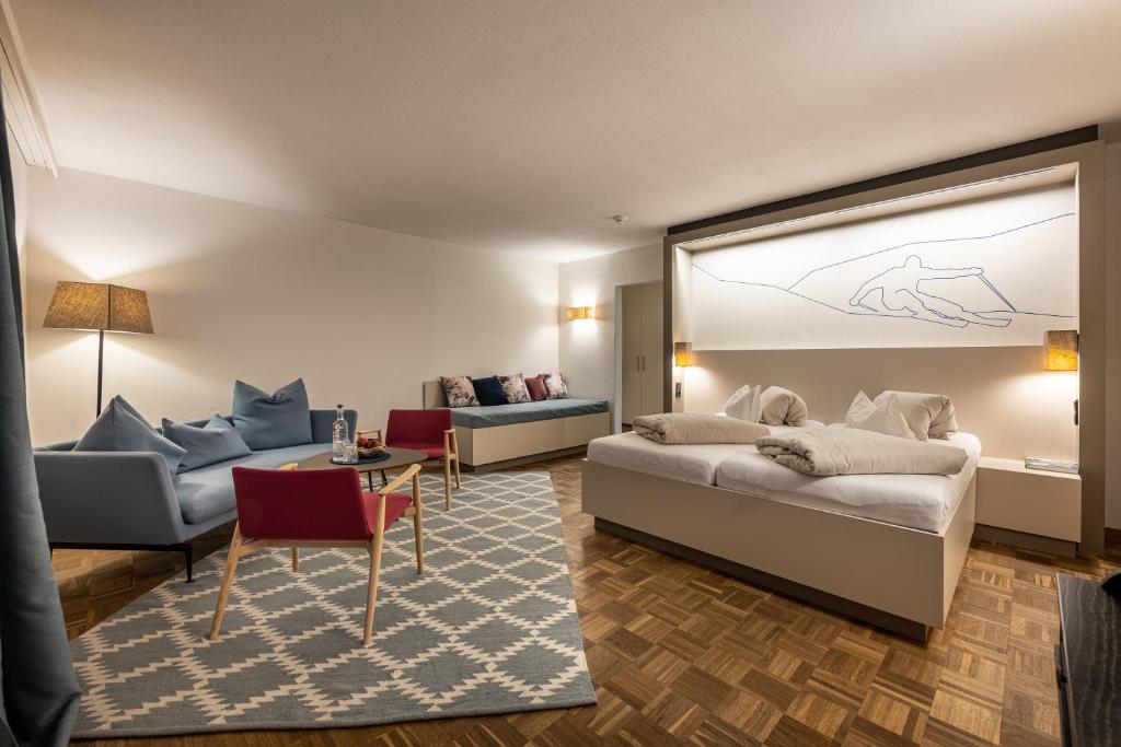 Postel nebo postele na pokoji v ubytování Hotel Wirtshaus Post