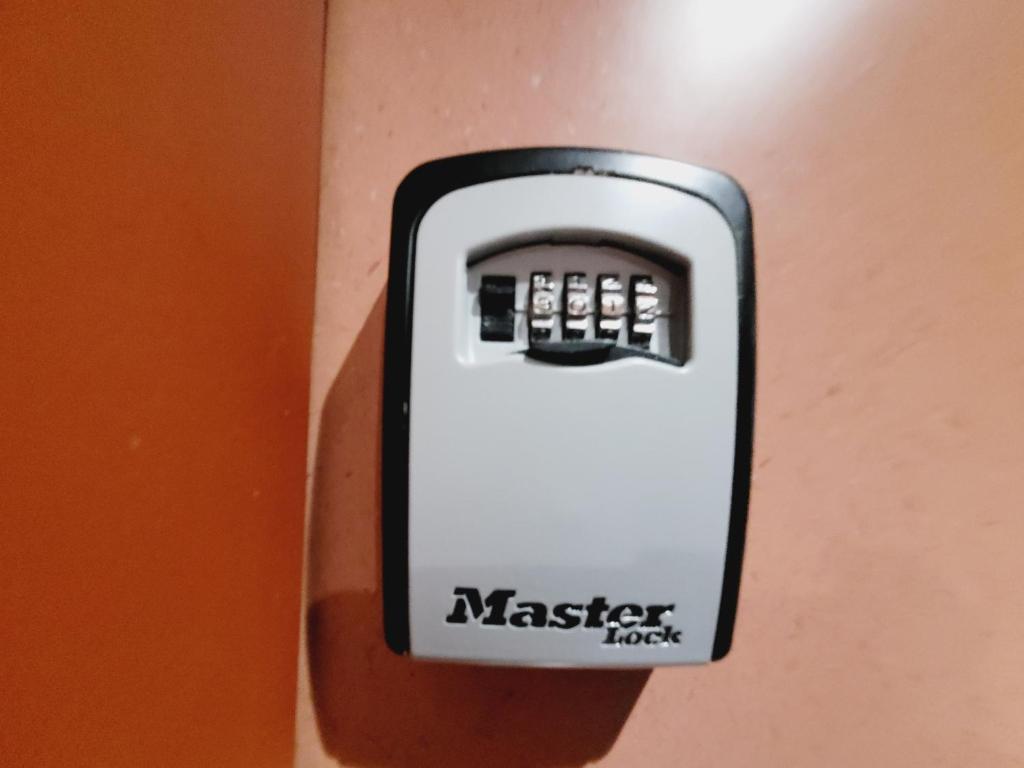 a button on a wall with a master switch at Esprit industriel au pied du Futuroscope in Chasseneuil-du-Poitou