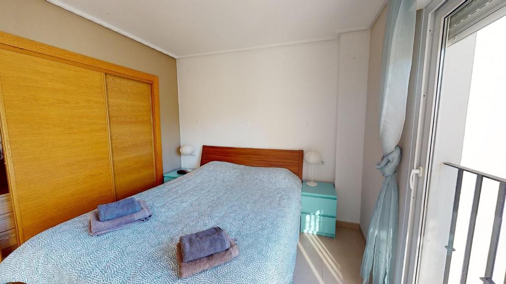 A bed or beds in a room at Casa Egeo W - A Murcia Holiday Rentals Property