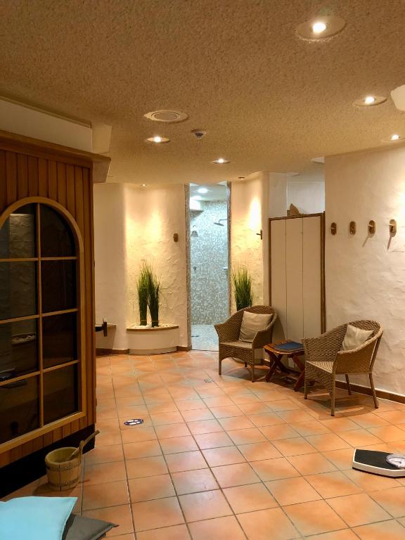 Posezení v ubytování Hotel am Wasserfall