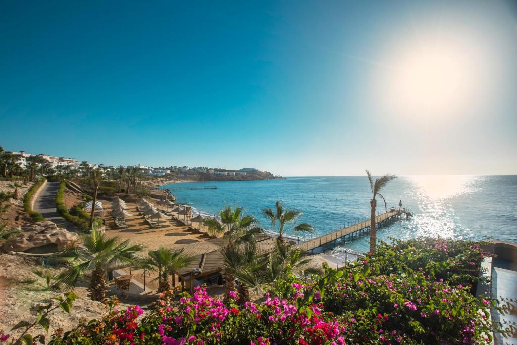 a view of the ocean from the balcony of a resort at Park Regency Sharm El Sheikh Resort in Sharm El Sheikh