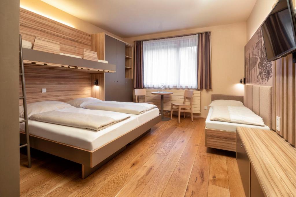 JUFA Hotel Malbun - Habitación Cuádruple
