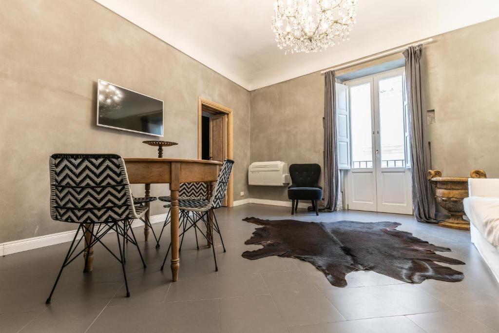 A television and/or entertainment centre at San Giuseppe Luxury Apartment