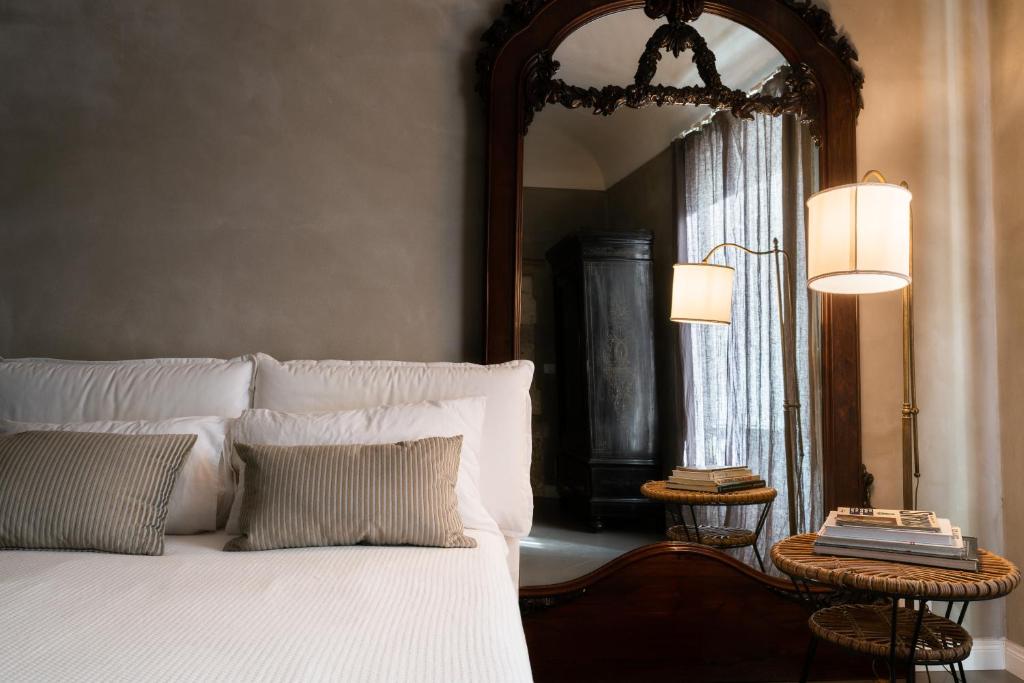 A bed or beds in a room at San Giuseppe Luxury Apartment