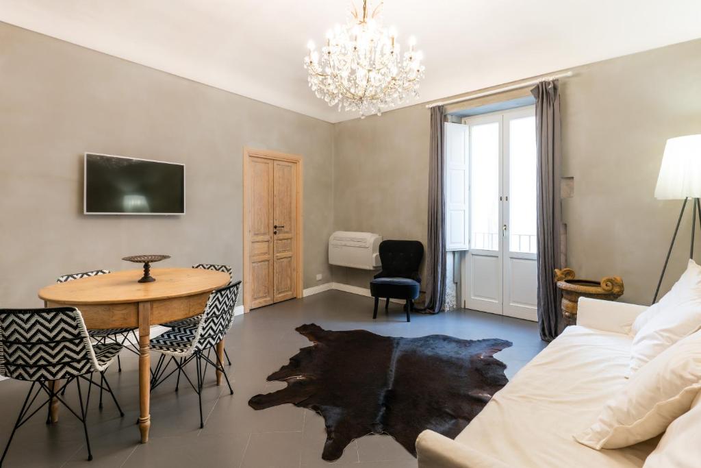 A television and/or entertainment centre at San Giuseppe Luxury Apartment