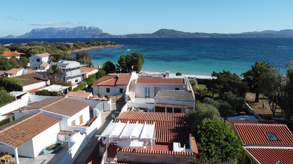 an aerial view of a town on the beach at Casa Perdas - Gate to the Sea by Homey Experience in Olbia