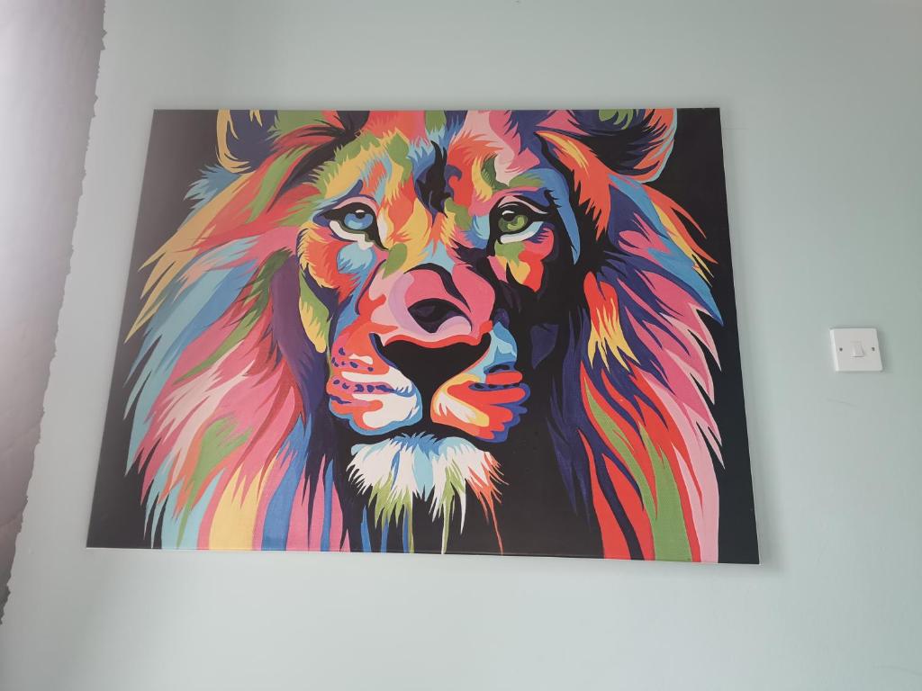a painting of a lion painted at Over looking the bushmills distillery in Bushmills