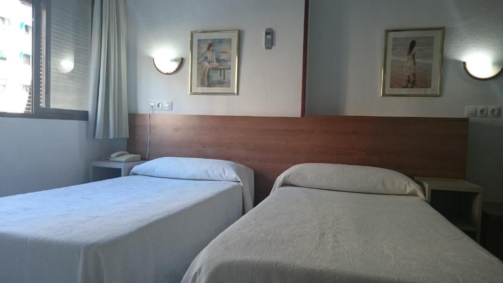 Postel nebo postele na pokoji v ubytování Pension Terminal