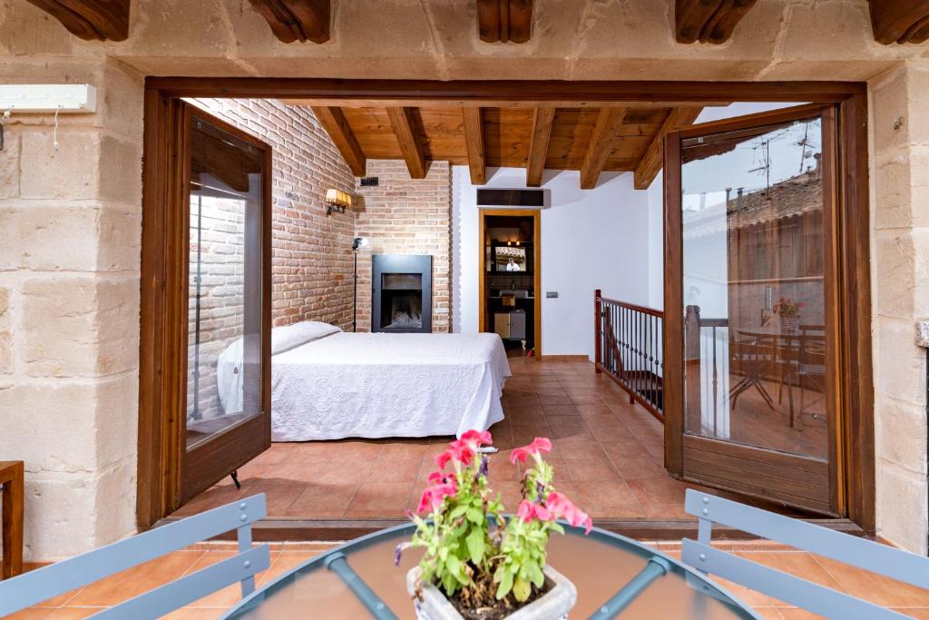 Postel nebo postele na pokoji v ubytování Apartamento Duplex Puente de Piedra, en un enclave único y exclusivo