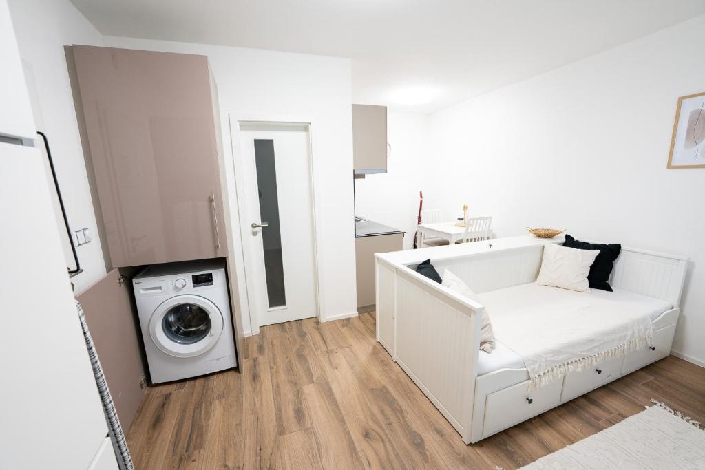 Kuchyň nebo kuchyňský kout v ubytování Apartmány Gemini