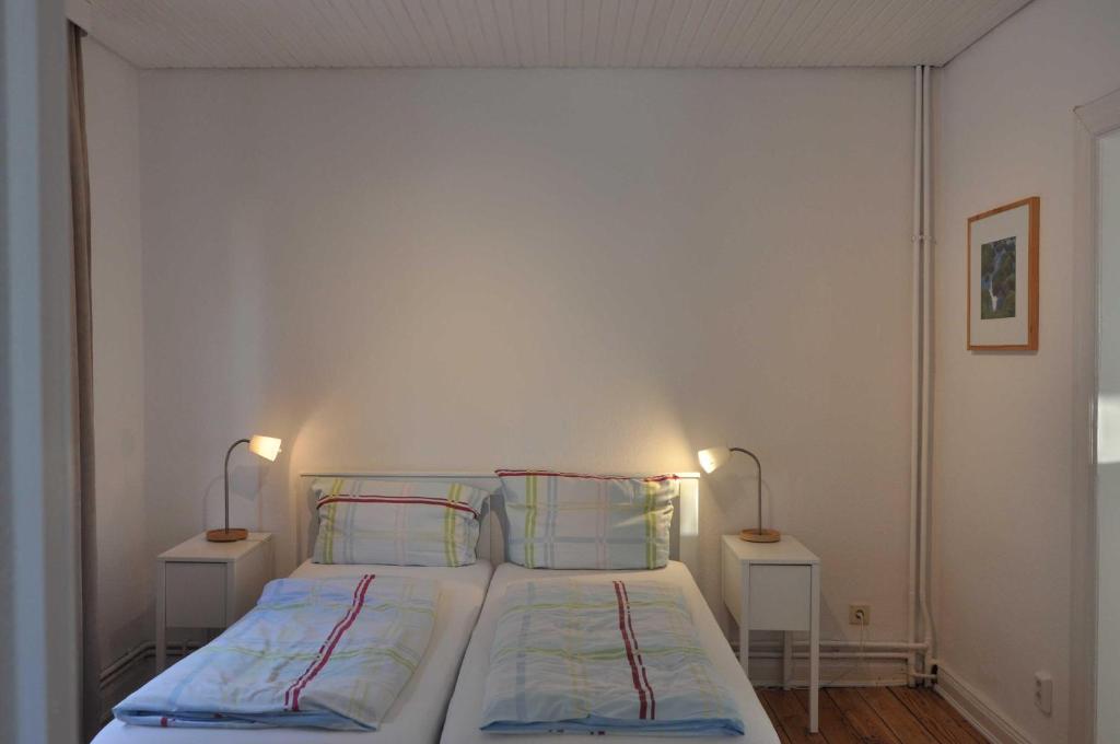 Postel nebo postele na pokoji v ubytování Appartementhaus Flori