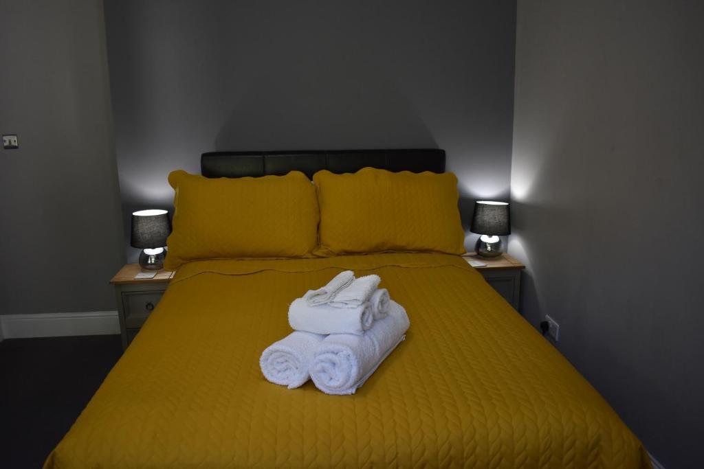 Postel nebo postele na pokoji v ubytování Moorlands