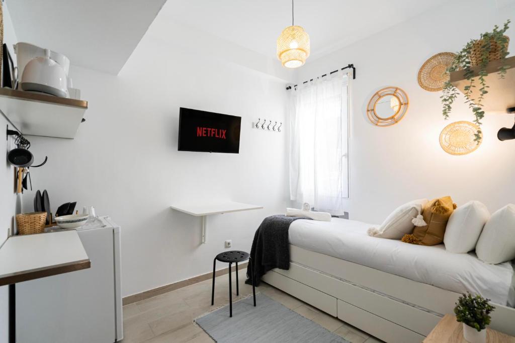 TV a/nebo společenská místnost v ubytování Estudio con encanto en Fuencarral