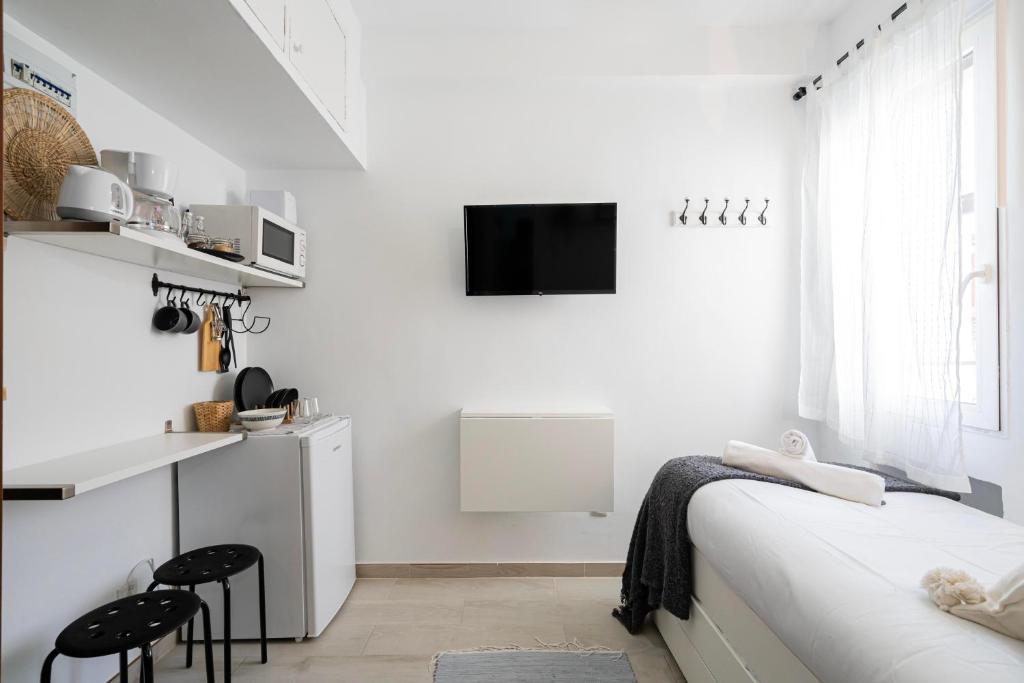 TV a/nebo společenská místnost v ubytování Estudio con encanto en Fuencarral