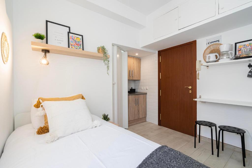 Postel nebo postele na pokoji v ubytování Estudio con encanto en Fuencarral