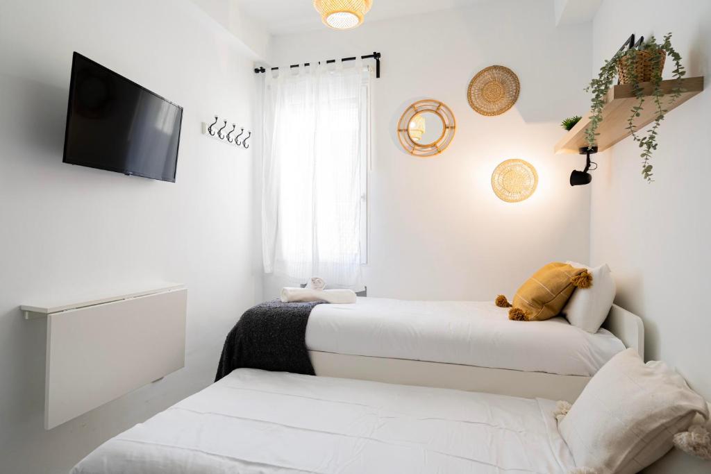 Postel nebo postele na pokoji v ubytování Estudio con encanto en Fuencarral