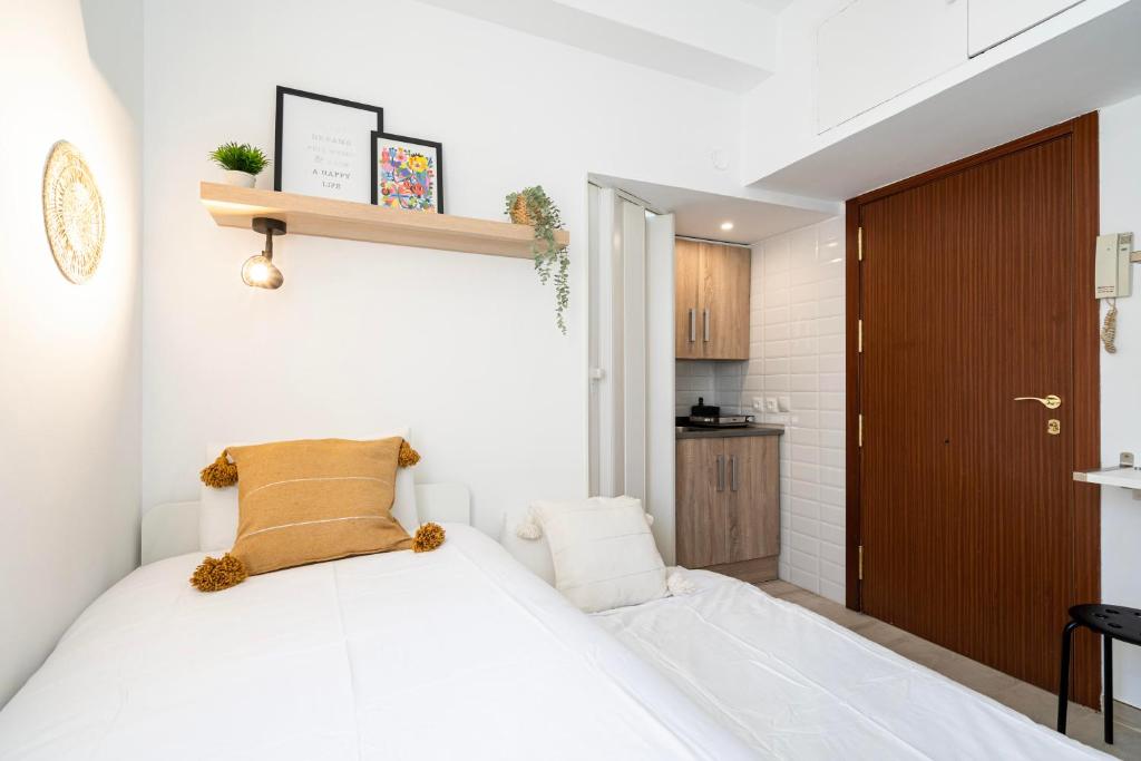 Postel nebo postele na pokoji v ubytování Estudio con encanto en Fuencarral