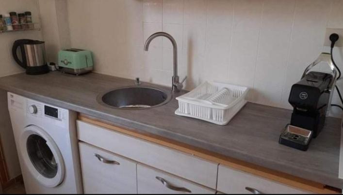 Kuchyň nebo kuchyňský kout v ubytování Dennis Apartment