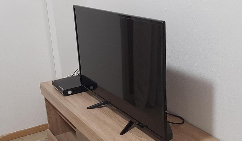 TV a/nebo společenská místnost v ubytování Dennis Apartment