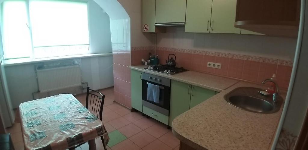 Kuchyň nebo kuchyňský kout v ubytování Apartments for rent