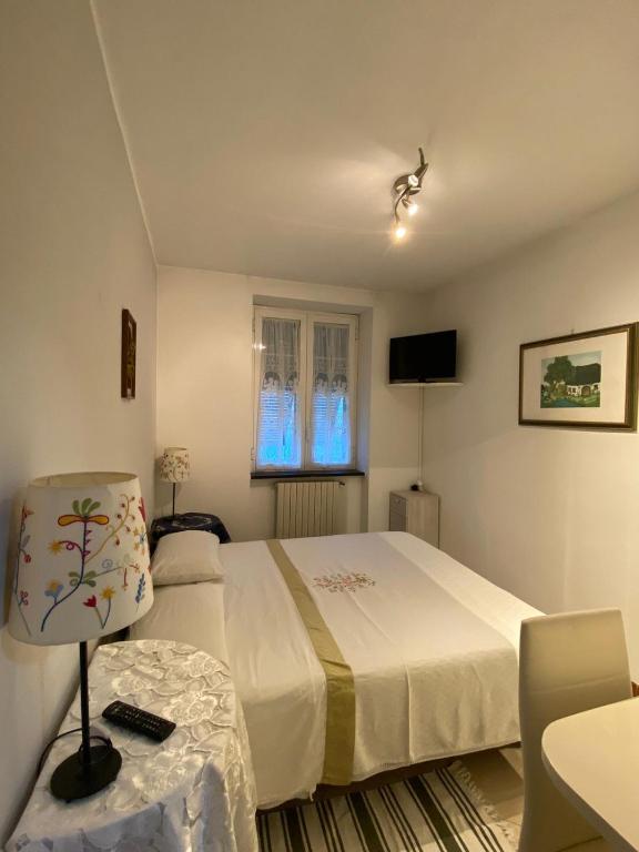Postel nebo postele na pokoji v ubytování L'angolo di Chiavari