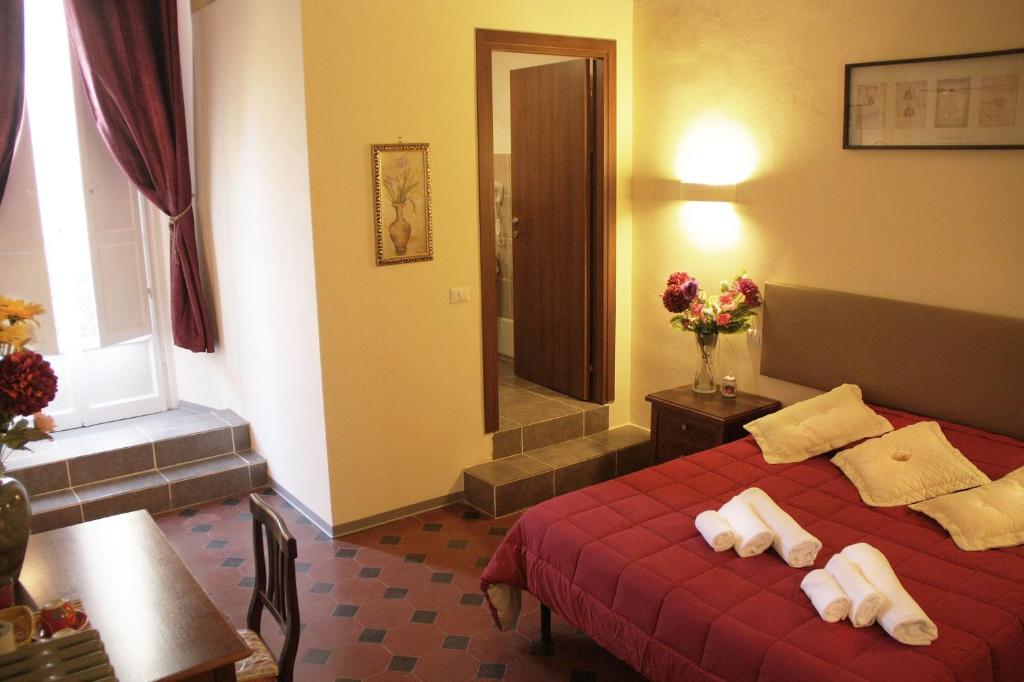 Voodi või voodid majutusasutuse Il Verrocchio toas