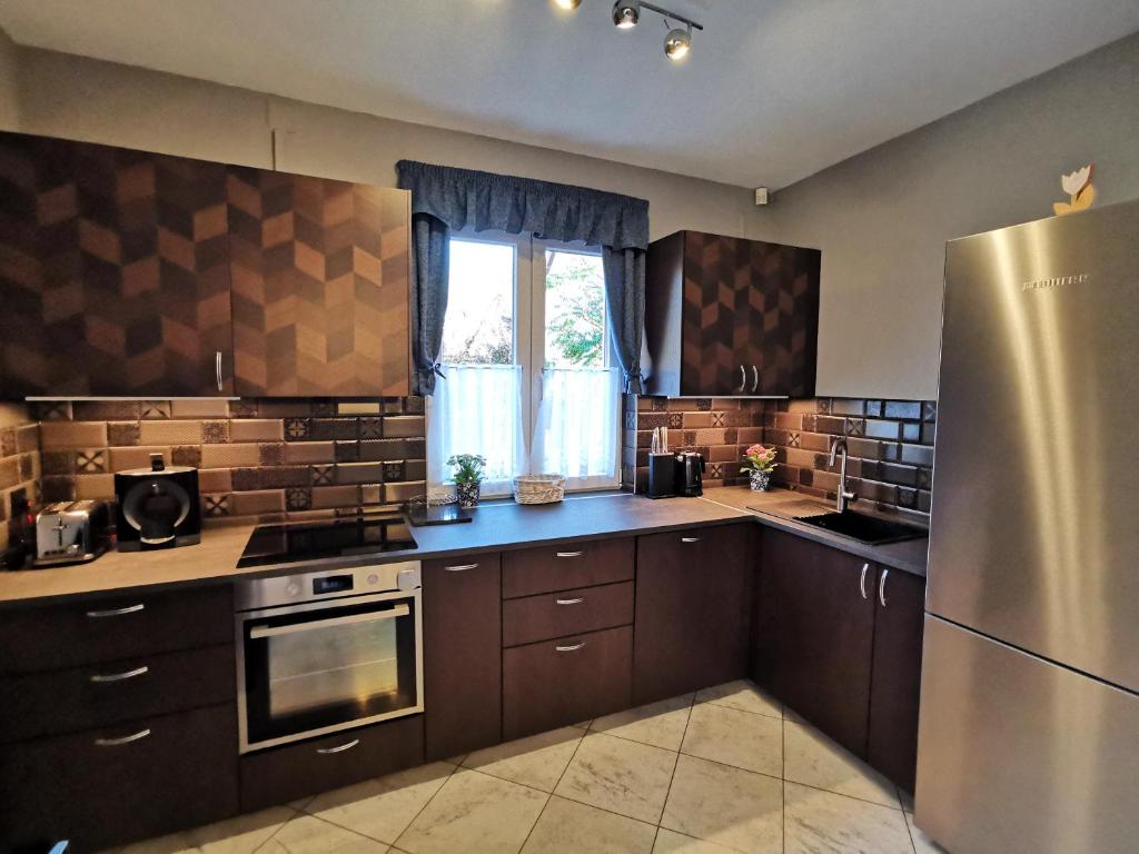 Kuchyňa alebo kuchynka v ubytovaní Villa Wellness