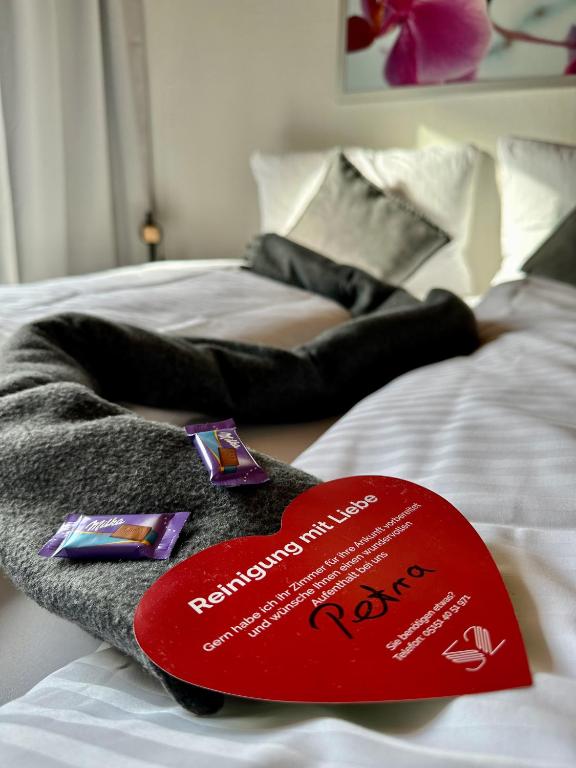 Postel nebo postele na pokoji v ubytování Hotel Schultheiss Hameln