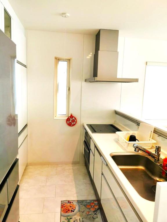 Kuchyň nebo kuchyňský kout v ubytování Bell house