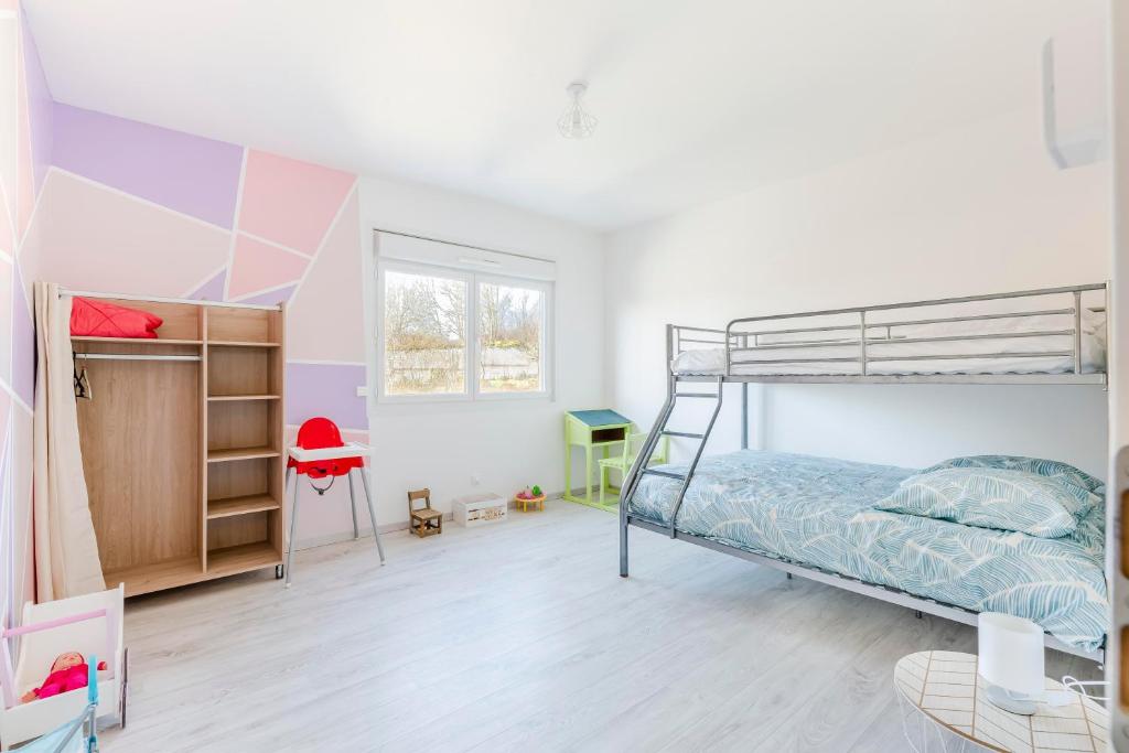 Posteľ alebo postele v izbe v ubytovaní Le Gîte des 5 étangs