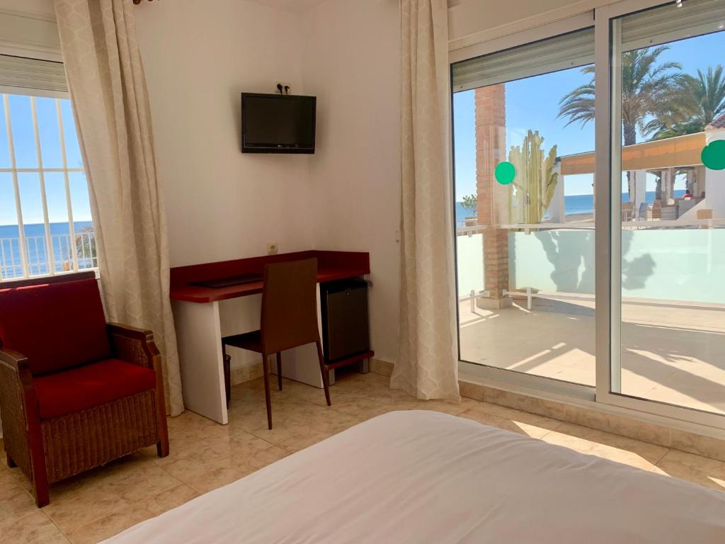 Postel nebo postele na pokoji v ubytování Hospedium Hotel Continental