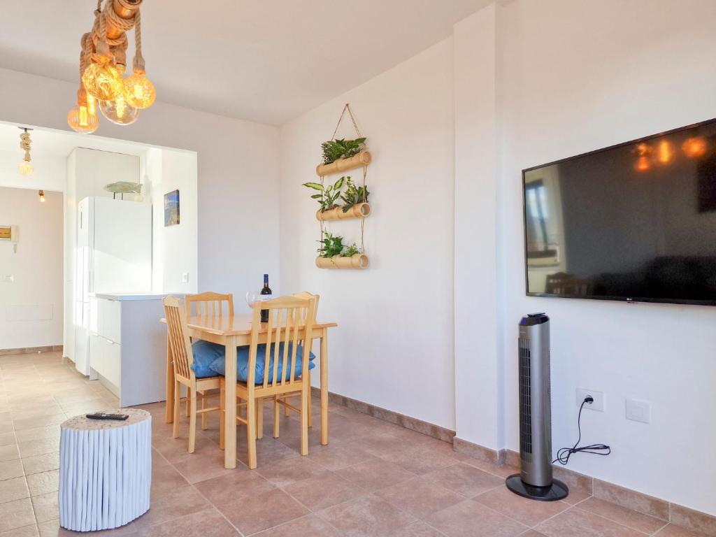 TV a/nebo společenská místnost v ubytování MEDANO4YOU The Ocean Terrace Penthouse