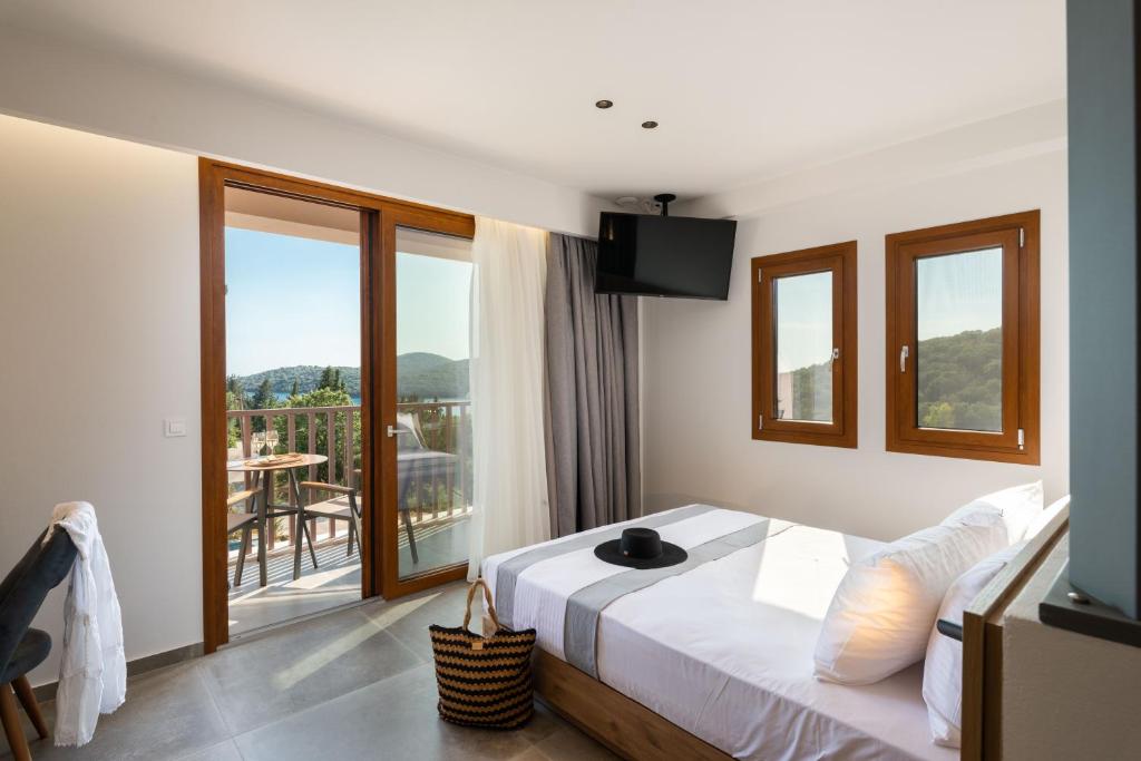 Posteľ alebo postele v izbe v ubytovaní Neoma Luxury Residence - Adults Only