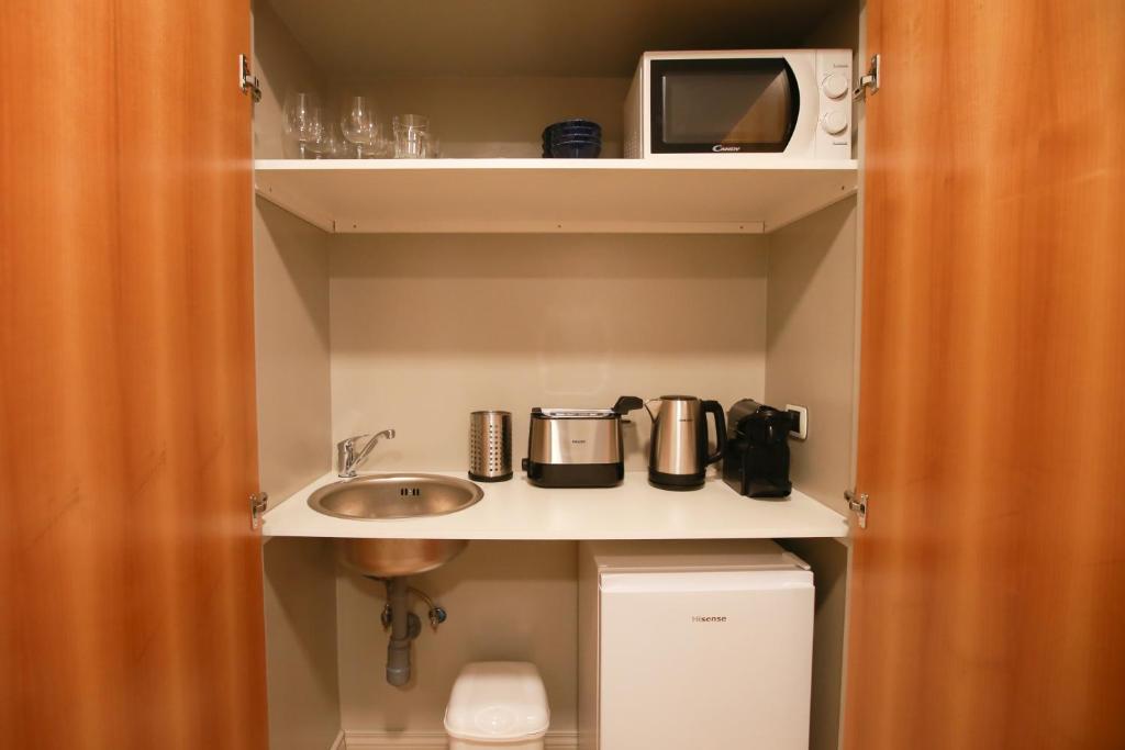 A kitchen or kitchenette at Duelle Vatican Suite